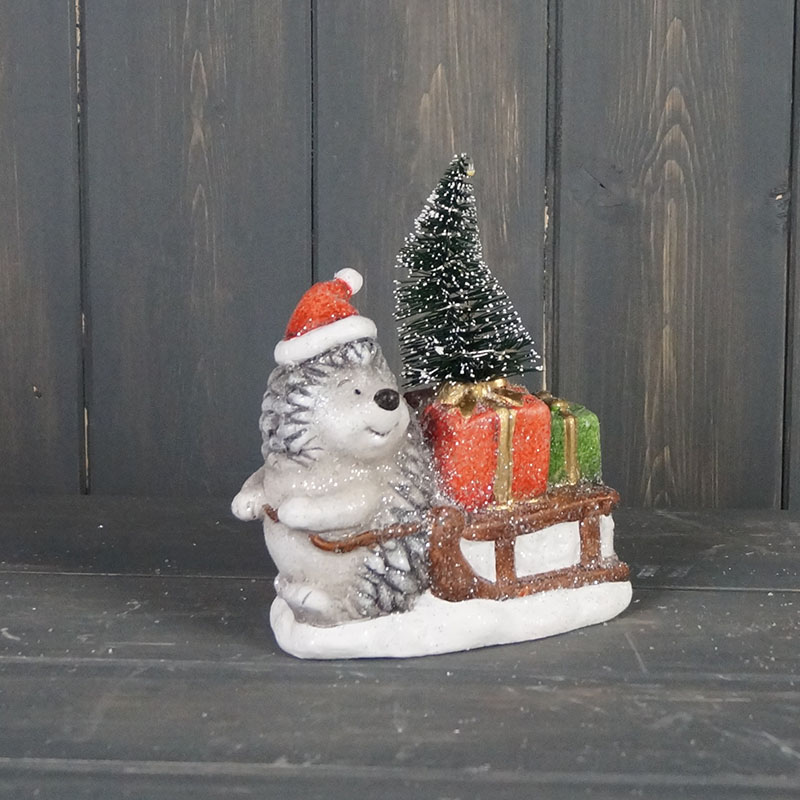 Hedgehog to the left with Sledge and Light Up Tree detail page